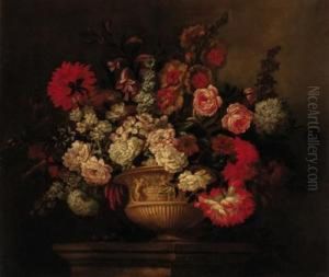 Roses, Lilies, Narcissi, Marigolds And Other Flowers In Asculptured Urn On A Plinth