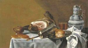 A ham and a bread roll on pewter plates