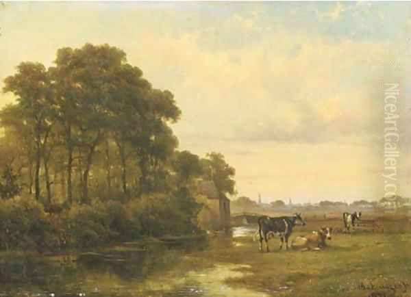 Cattle by a river, a town beyond - view 1