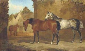 A bay and a grey hunter in a courtyard, with a groom leading another horse to a stable by Henry Barraud