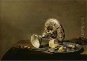 A Still Life With An Overturned 
Silver Tazza, A Silver Plate With A Partly Peeled Lemon And An Olive, 
With Walnuts And Hazelnuts On A Table Draped With A Green Cloth by Pieter Claesz.
