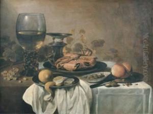 A Crab On A Pewter Plate, A 
Roemer, A Partly-peeled Lemon On Apewter Platter, A Bowl Of Olives, A 
Bread Roll And A Knife On Apewter Plate With Grapes, Walnuts And 
Hazelnuts On A Partly-drapedtable