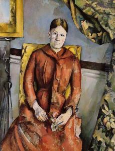 Madame Cezanne In A Yellow Chair by Paul Cezanne