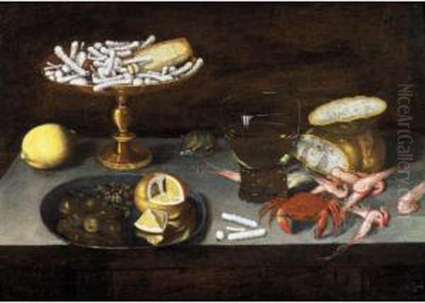 Still Life Of Sweetmeats On A
Gilt Tazza, A Lemon, A Pewter Plate With Olives, Capers And A Lemon, A
Roemer, A Bread-roll, Shrimps And A Crab, Together With A Mouse, All
Upon A Table-top - view 1