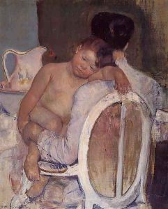 Mother Holding A Child In Her Arms