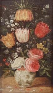 Tulips, Roses, Forget-me-nots
And Other Flowers In A Blue And White Porcelain Vase On A Table by Andries Daniels or Danielsz