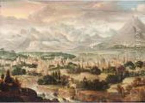 A View Of A Town With Mountains Beyond