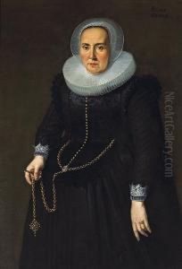 A Portrait Of A Lady,
Three-quarter Length, Ina Black Dress With An Embroidered Bodice, Lace
Cuffs And Collar,holding A Large Gold Chain by Thomas De Keyser