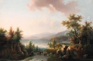 A Wooded Hilly Landscape With Travellers On A Track Near Alake