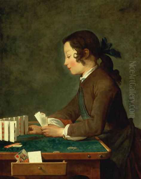 Boy Building a Castle of Cards - view 1