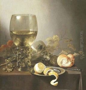 A giant roemer, an upturned roemer, grapes on the vine, a roll of bread, a knife and a partly-peeled lemon on a platter on a draped table