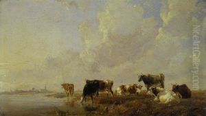 Cattle by a river