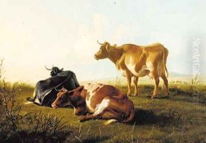 Cattle resting on a grassy mound in an extensive landscape by Thomas Sidney Cooper