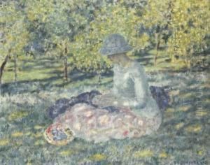 Woman Seated In A Park With Basket