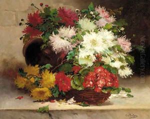 Chrysanthemums and Geraniums in a basket on a ledge