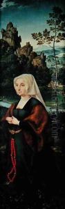 Wife of a donor kneeling by a river