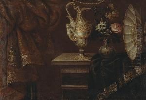 A Still Life With An Ewer,
Footed Basin And Flowers In A Glass Vase On A Partially Draped Table by Antonio Gianlisi The Younger