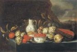 Grapes, Plums, Figs, Pears, 
Peaches, Oranges, A Melon, A Kraakporcelain Bowl Of Strawberries On A 
Pewter Platter With A Jug And Aglass Of Wine On A Stone Ledge In A 
Landscape by Jan Pauwel Gillemans The Elder