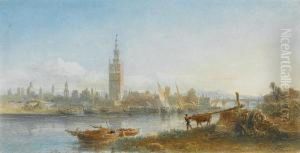 The Guadalquivir River, Seville, With The Giralda Tower In The Distance