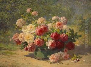 A Mixed Bouquet Of Roses In A Green Barrel
