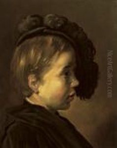 Profile Of A Boy Wearing A Black Cap