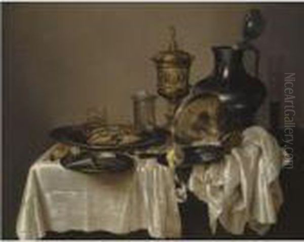 A Monochrome Still Life With A 
Silver-gilt Goblet, An Overturnedsilver Tazza, A Pewter Flagon, Glasses 
And A Salt Cellar, With Acrab, Oysters, Nuts, A Knife And A Peeled Lemon
 On A Table Drapedwith A White Cloth - view 1