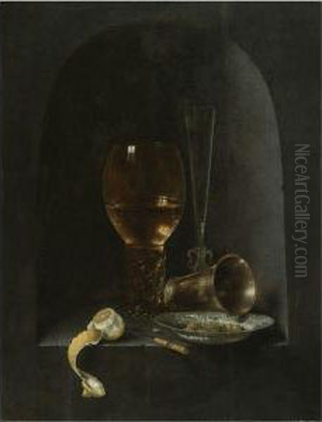 Still Life With A Roemer, A
Fluted Wine-glass, A Silver Goblet, Ablue-and-white Porcelain Bowl
Filled With Green Olives, A Partlypeeled Lemon And A Knife, All Arranged
Within A Stone Niche - view 1
