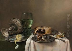 A 'pronk' Still-life, With A
Roemer, An Upturned Silver Tazza, Ahalf-peeled Lemon On A Pewter Plate,
With A Pie, A Timepiece And Aknife by Willem Claesz. Heda