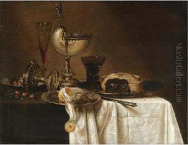 Still Life With An Overturned
Tazza, A Tall Wine Glass, An Open Pie On A Pewter Plate, A Partly Peeled
Lemon And A Nautilus Cup All Arranged On A Partly Draped Table - view 1