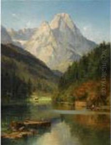 A Lake At The Foot Of A Mountain With Figures In A Row Boat