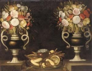 Mixed Flowers In A Pair Of Urns,
 Bread, A Jug Of Wine And Figs On A Silver Dish On A Ledge by Tomas Hiepes