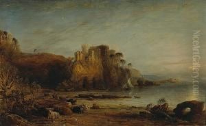 A View Of A Castle On The Cliff Of A Rocky Coast With Highland Cattle On The Beach Below