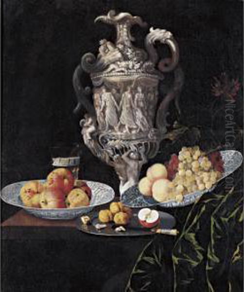 Still Life With An Elaborately
Sculpted Urn And Blue And White Porcelain Bowls With Fruit - view 1