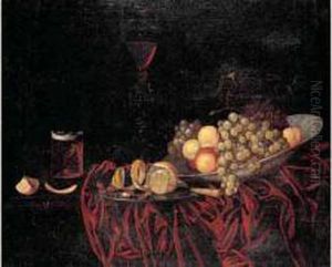 Nature Morte A La Coupe De Fruits, Aux Pieces De Verrerie, Au
 Citron Et Aux Noisettes Disposes Sur Un Entablement by Johann Georg (also Hintz, Hainz, Heintz) Hinz