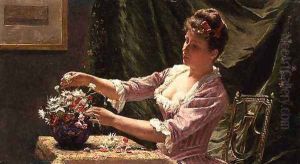 Young Woman Arranging Flowers by Emile Claus