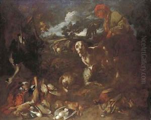 A wooded landscape with a falconer and two dogs with dead game, a huntsman beyond by Giovanni Francesco Castiglione