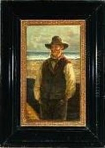 A Fisherman Standing On A Beach With His Hands In The Pockets