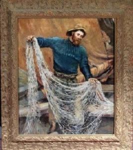 A Fisherman Unloading A Net