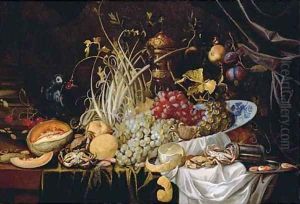 A Dutch Delft blue and white bowl with grapes, prawns on a pewter plate, crabs, a partly-peeled lemon and a melon on a partly-draped table by Alexander Coosemans