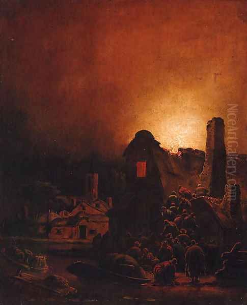 A fire in a village at night - view 1