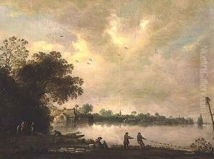 A river landscape with fishermen drawing in a net by Jan Coelenbier
