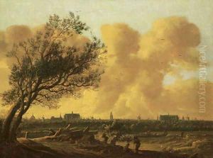 A panaromic view of Leiden with figures under a tree in the foreground