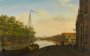 A Dutch Townscape With Barges On A Canal