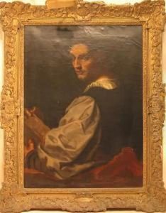 Portrait Of A Man Holding A Book