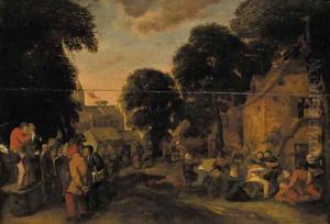 A village fair with a quack and boors fighting outside an inn by Joos van Craesbeeck