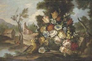 Mixed flowers in a basket in a clearing