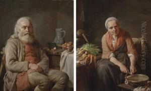 A Bearded Man Seated At A Kitchen Table; And A Woman Slicing Carrots A Bearded Man Seated At A Kitchen Table; And A Woman Slicing Carrots