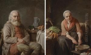 A Bearded Man Seated At A Kitchen Table
