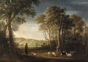 A wooded landscape with shepherds with their flocks in a clearing