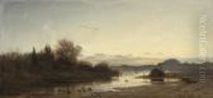 Ducks On A Lake At Dusk